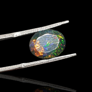 Black Ethiopian opal faceted 11x9 mm no 637