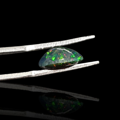 Black Ethiopian opal faceted 11x9 mm no 637 Black Ethiopian opal faceted 11x9 mm no 637