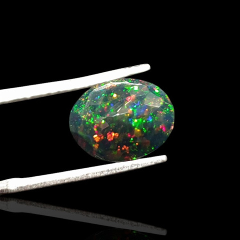 Black Ethiopian opal faceted 11x9 mm no 637 Black Ethiopian opal faceted 11x9 mm no 637