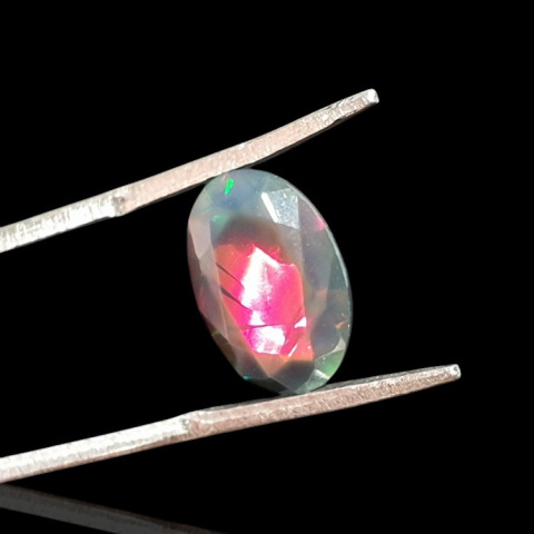 Black Ethiopian opal faceted 12x8 mm no 623 Black Ethiopian opal faceted 12x8 mm no 623