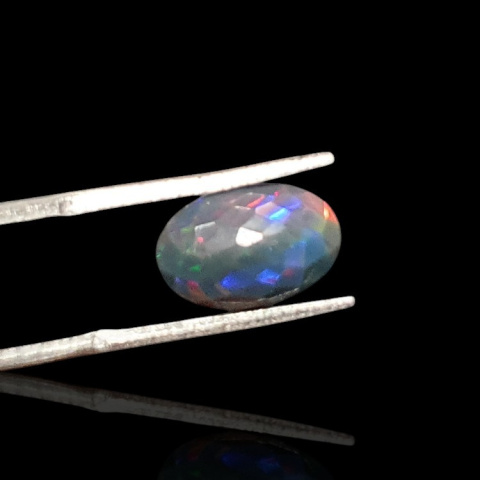 Black Ethiopian opal faceted 12x8 mm no 623 Black Ethiopian opal faceted 12x8 mm no 623