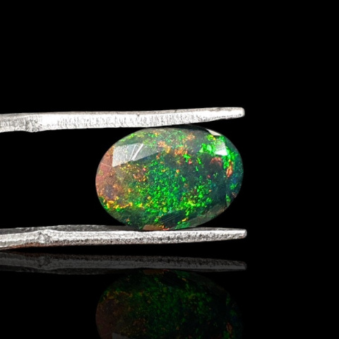 Black Ethiopian opal faceted 12x8 mm no. 630 Black Ethiopian opal faceted 12x8 mm no. 630