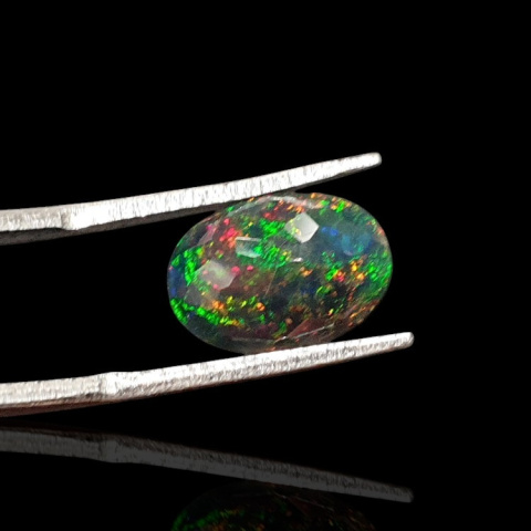 Black Ethiopian opal faceted 12x8 mm no. 630 Black Ethiopian opal faceted 12x8 mm no. 630