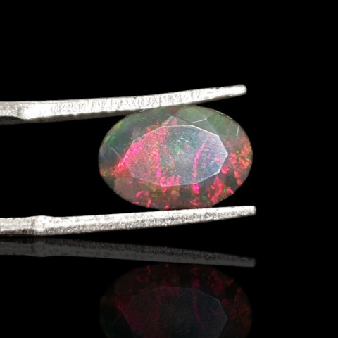 Black Ethiopian opal faceted 12x8 mm no 639 Black Ethiopian opal faceted 12x8 mm no 639