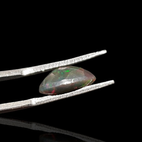 Black Ethiopian opal faceted 12x8 mm no 639 Black Ethiopian opal faceted 12x8 mm no 639
