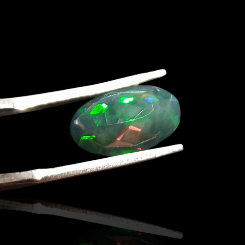 Black Ethiopian opal faceted 13x7 mm no 622 Black Ethiopian opal faceted 13x7 mm no 622