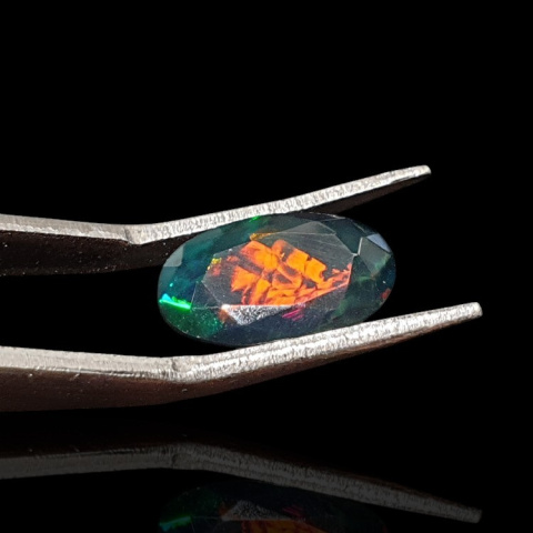 Black Ethiopian opal faceted 13x8 mm no 627 Black Ethiopian opal faceted 13x8 mm no 627