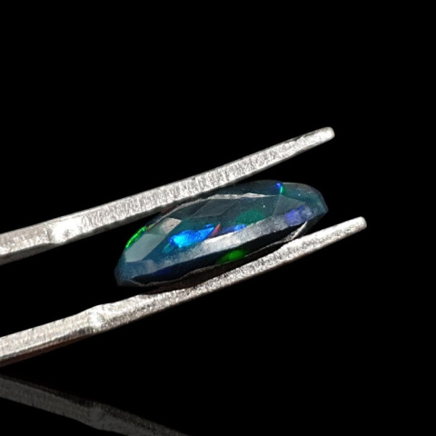 Black Ethiopian opal faceted 13x8 mm no 627 Black Ethiopian opal faceted 13x8 mm no 627