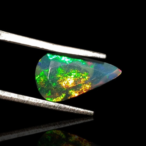 Black Ethiopian opal faceted 14x8 mm no 620 Black Ethiopian opal faceted 14x8 mm no 620
