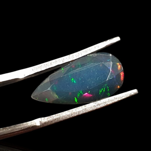 Black Ethiopian opal faceted 15x8 mm no. 625 Black Ethiopian opal faceted 15x8 mm no. 625