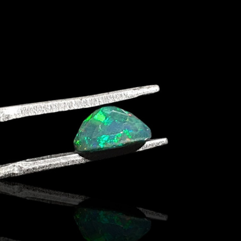 Black Ethiopian opal faceted 8x7 mm no 691 Black Ethiopian opal faceted 8x7 mm no 691