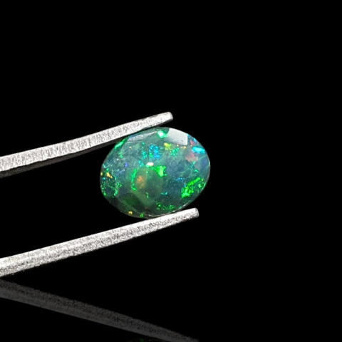 Black Ethiopian opal faceted 8x7 mm no 691 Black Ethiopian opal faceted 8x7 mm no 691