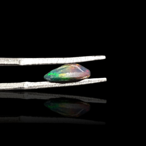 Black Ethiopian opal faceted 9x6 mm no. 672 Black Ethiopian opal faceted 9x6 mm no. 672
