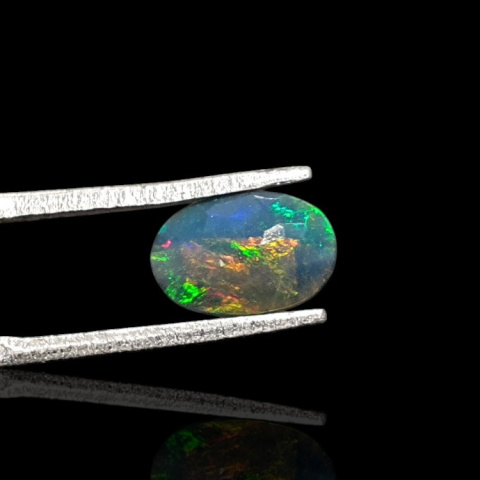 Black Ethiopian opal faceted 9x6 mm no. 672 Black Ethiopian opal faceted 9x6 mm no. 672