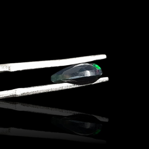 Black Ethiopian opal faceted 9x6 mm no. 693 Black Ethiopian opal faceted 9x6 mm no. 693