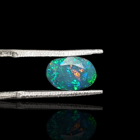 Black Ethiopian opal faceted 9x7 mm no 678 Black Ethiopian opal faceted 9x7 mm no 678