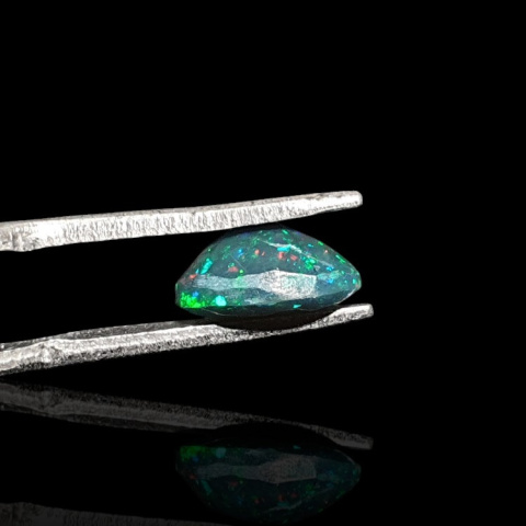 Black Ethiopian opal faceted 9x7 mm no 678 Black Ethiopian opal faceted 9x7 mm no 678