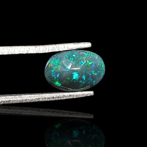 Black Ethiopian opal faceted 9x7 mm no 678 Black Ethiopian opal faceted 9x7 mm no 678