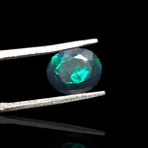 Black Ethiopian opal faceted 9x7 mm no. 680 Black Ethiopian opal faceted 9x7 mm no. 680