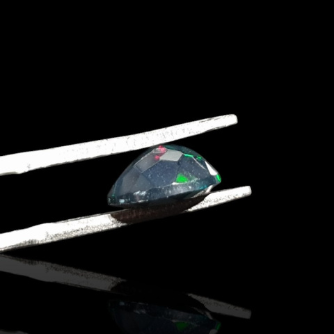 Black Ethiopian opal faceted 9x7 mm no. 680 Black Ethiopian opal faceted 9x7 mm no. 680