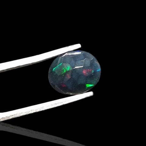Black Ethiopian opal faceted 9x7 mm no. 680 Black Ethiopian opal faceted 9x7 mm no. 680