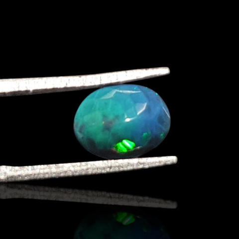 Black Ethiopian opal faceted 9x7 mm no. 683 Black Ethiopian opal faceted 9x7 mm no. 683