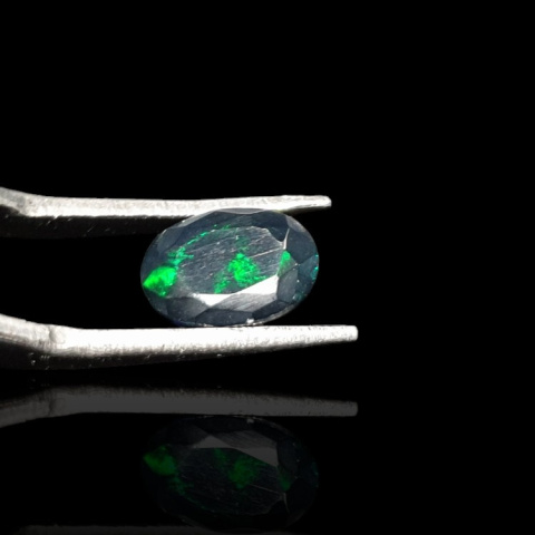 Black Ethiopian opal faceted 9x7 mm no 684 Black Ethiopian opal faceted 9x7 mm no 684