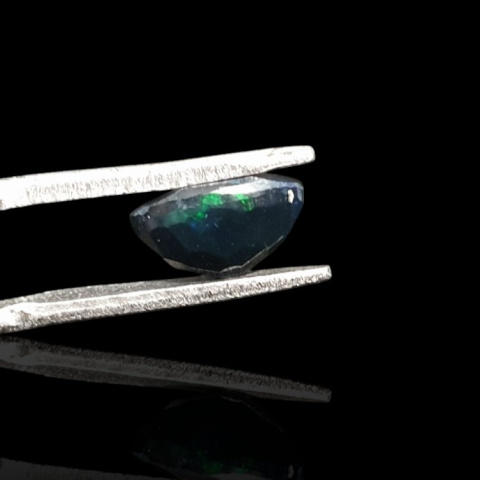 Black Ethiopian opal faceted 9x7 mm no 684 Black Ethiopian opal faceted 9x7 mm no 684