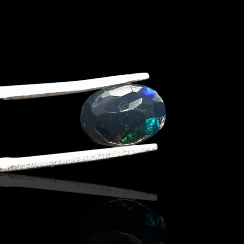 Black Ethiopian opal faceted 9x7 mm no 684 Black Ethiopian opal faceted 9x7 mm no 684