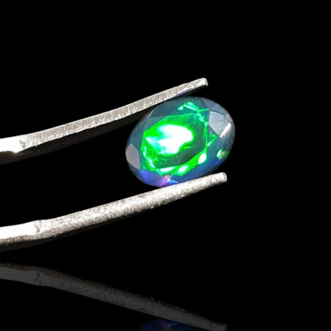 Black Ethiopian opal faceted 9x7 mm no. 685 Black Ethiopian opal faceted 9x7 mm no. 685