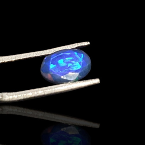Black Ethiopian opal faceted 9x7 mm no. 685 Black Ethiopian opal faceted 9x7 mm no. 685