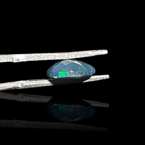 Black Ethiopian opal faceted 9x7 mm no. 685 Black Ethiopian opal faceted 9x7 mm no. 685