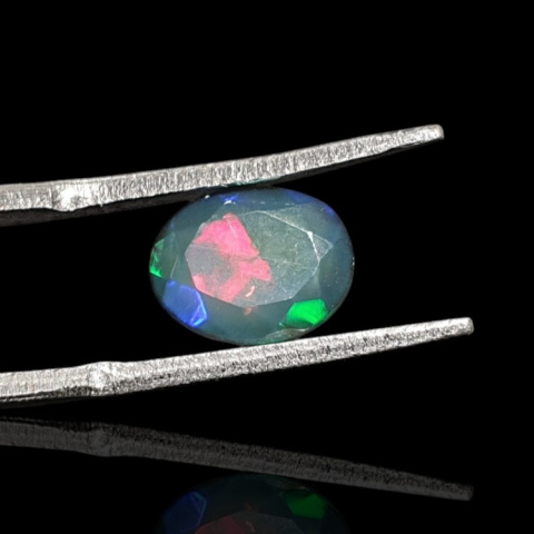 Black Ethiopian opal faceted 9x7 mm no. 686 Black Ethiopian opal faceted 9x7 mm no. 686