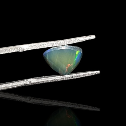 Black Ethiopian opal faceted 9x7 mm no. 686 Black Ethiopian opal faceted 9x7 mm no. 686