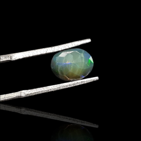Black Ethiopian opal faceted 9x7 mm no. 686 Black Ethiopian opal faceted 9x7 mm no. 686
