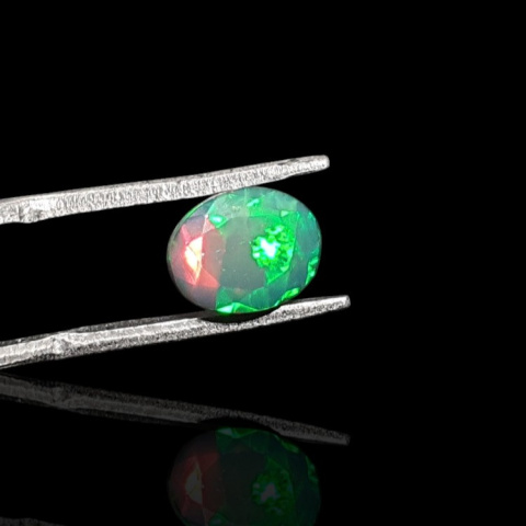 Black Ethiopian opal faceted 9x7 mm no. 687 Black Ethiopian opal faceted 9x7 mm no. 687