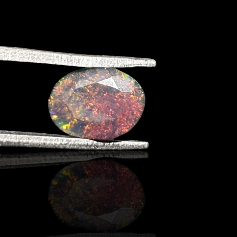 Black Ethiopian opal faceted 9x7 mm no 690