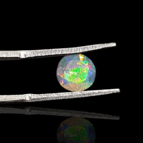 Black Ethiopian opal faceted fi 7 mm no 712 Black Ethiopian opal faceted fi 7 mm no 712