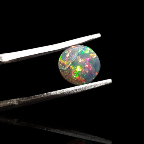 Black Ethiopian opal faceted fi 7 mm no 712 Black Ethiopian opal faceted fi 7 mm no 712