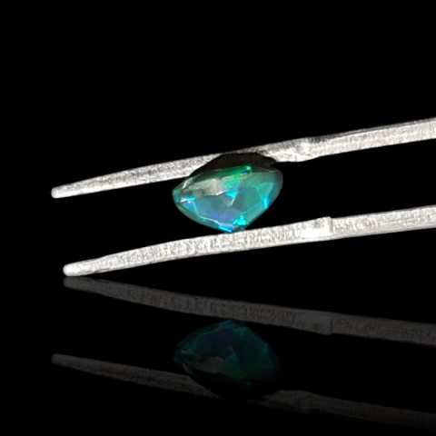 Black Ethiopian opal faceted fi 7 mm no 713 Black Ethiopian opal faceted fi 7 mm no 713
