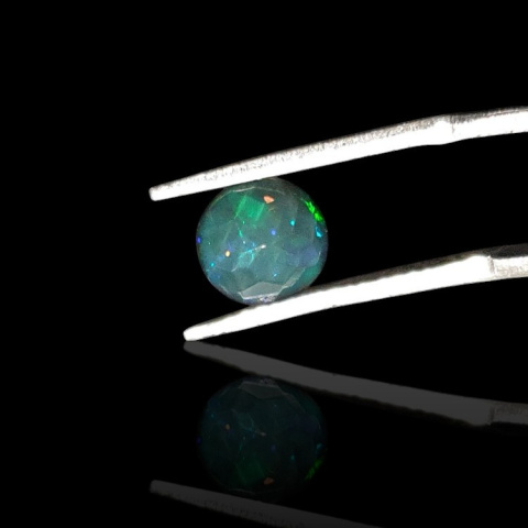 Black Ethiopian opal faceted fi 7 mm no 713 Black Ethiopian opal faceted fi 7 mm no 713