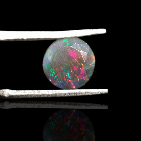 Black Ethiopian opal faceted fi 8 mm no. 706 Black Ethiopian opal faceted fi 8 mm no. 706