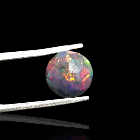Black Ethiopian opal faceted fi 8 mm no. 706 Black Ethiopian opal faceted fi 8 mm no. 706