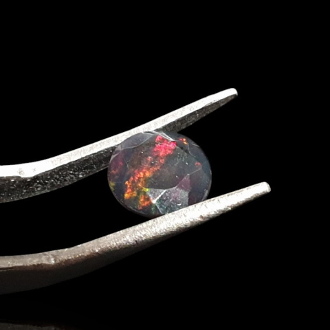 Black Ethiopian opal faceted fi 8 mm no. 708 Black Ethiopian opal faceted fi 8 mm no. 708