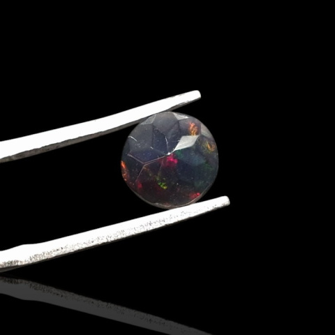 Black Ethiopian opal faceted fi 8 mm no. 708 Black Ethiopian opal faceted fi 8 mm no. 708