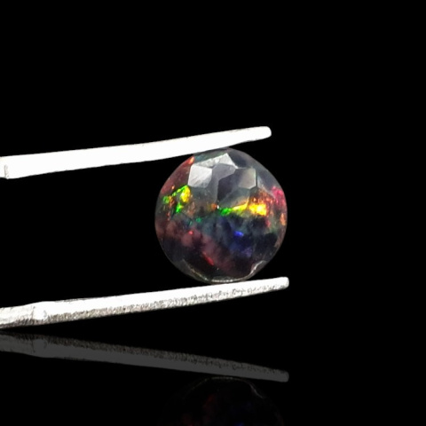 Black Ethiopian opal faceted fi 9 mm no 704 Black Ethiopian opal faceted fi 9 mm no 704