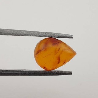 Baltic amber cabochon 9x7 mm no 374