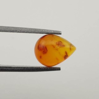 Baltic amber cabochon 9x7 mm no 379