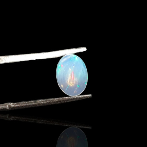 Opal from Ethiopia cabochon 8x6 mm no 744 Opal from Ethiopia cabochon 8x6 mm no 744