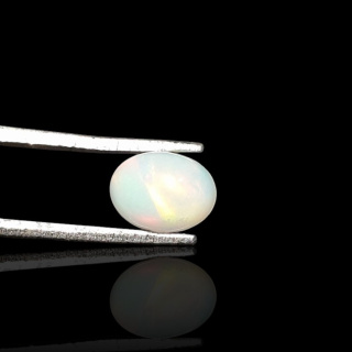 Opal from Ethiopia cabochon 8x6 mm no 757